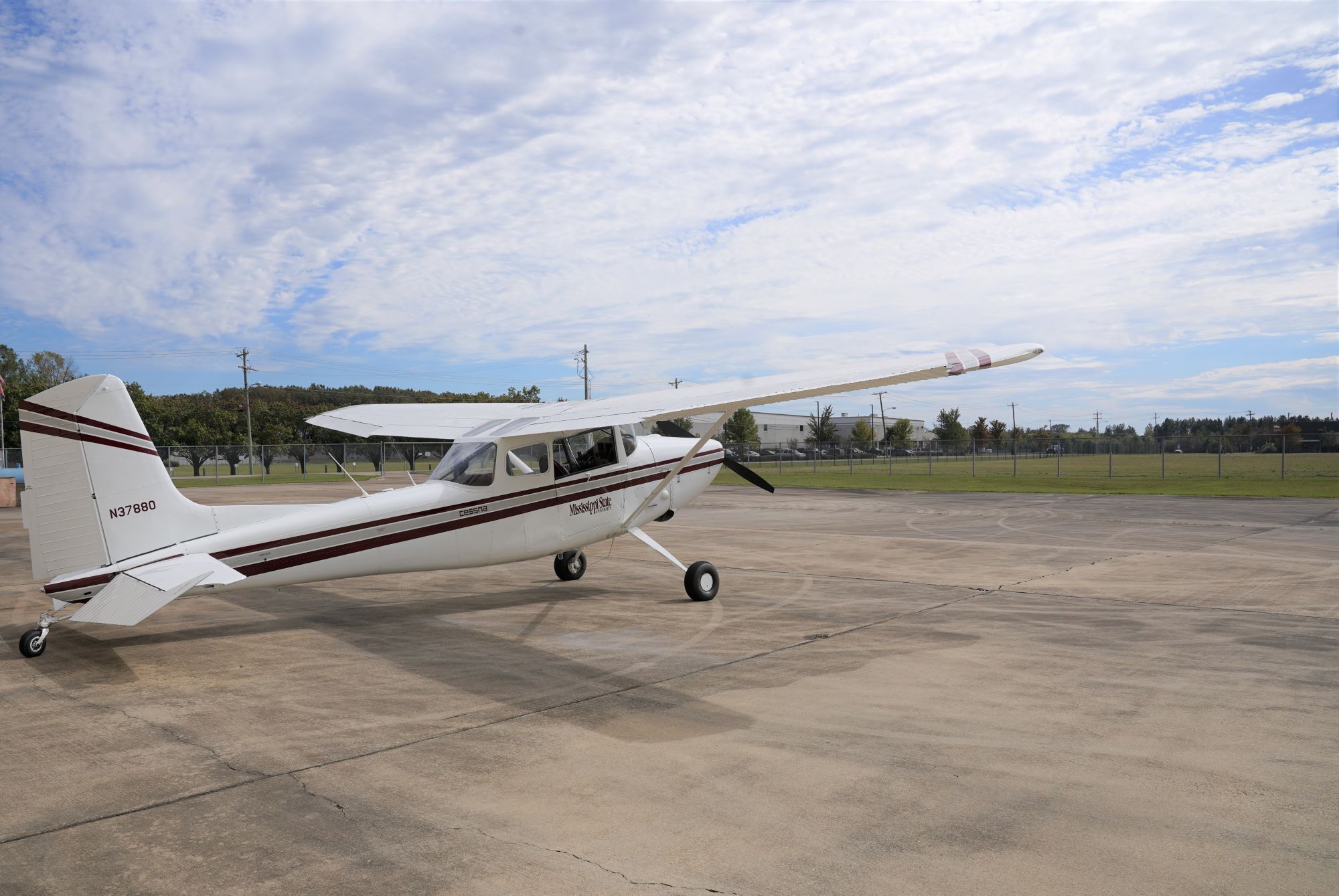 Raspet's Cessna sits outside its hangar. 