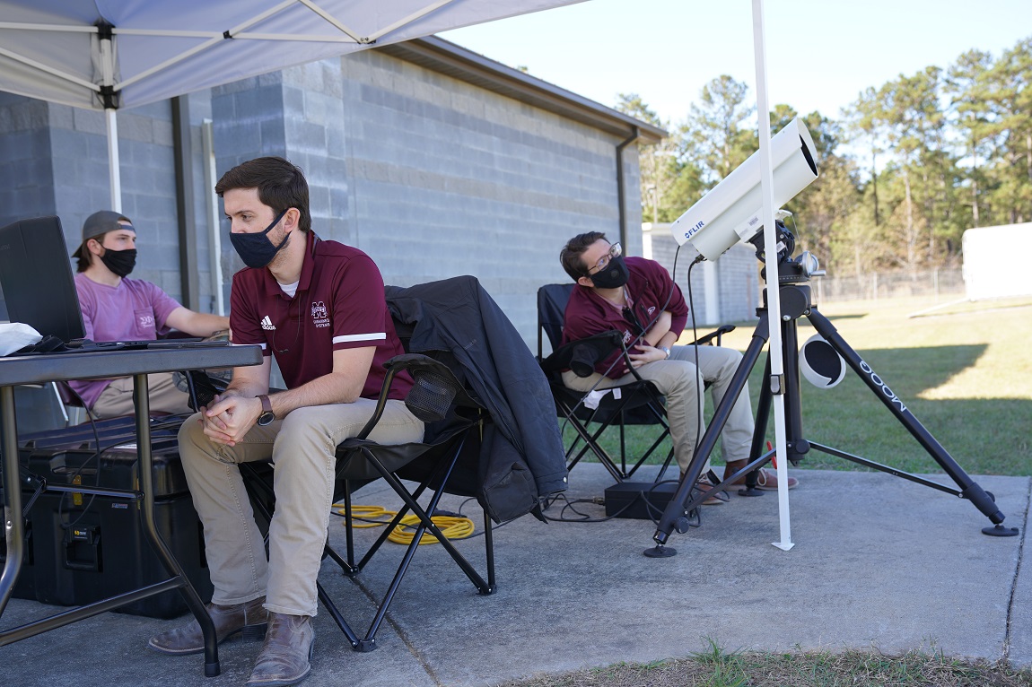 Raspet engineers use a thermal camera during a flight test.