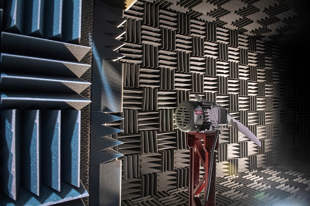 An exterior view of an anechoic chamber equipped with MSU Raspet signage.   